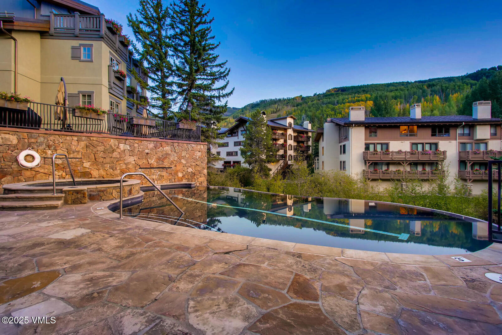 1 Willow Bridge Road, Unit 34 Vail, CO 81657 - Photo 21 of 27 Infinity Pool with Mountain Views