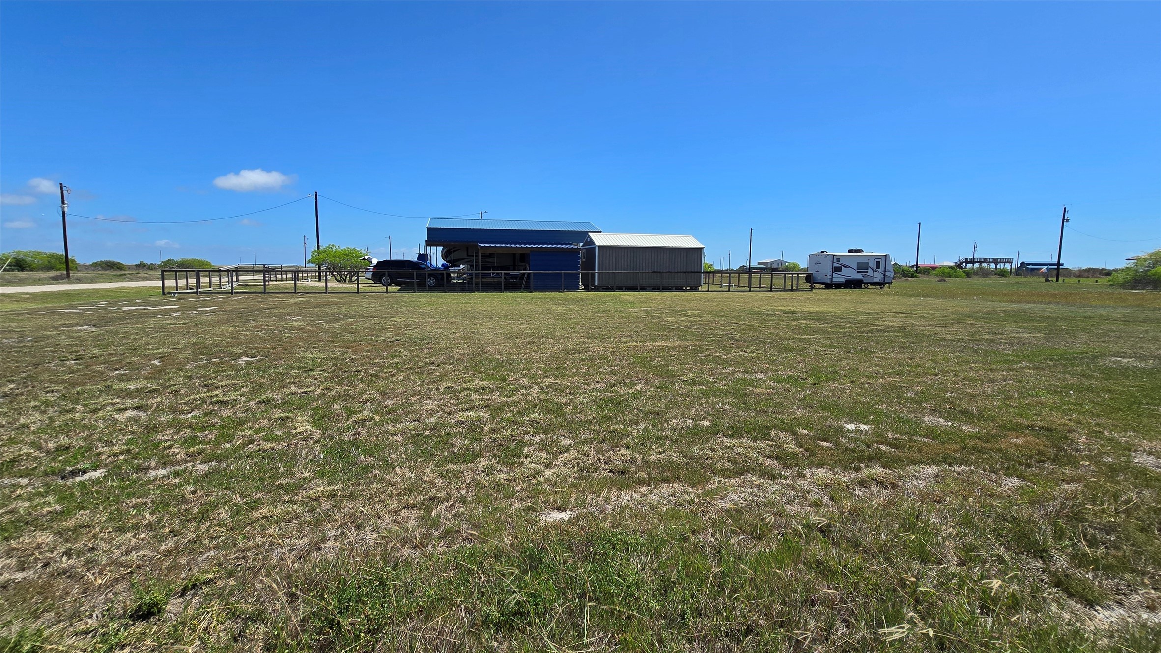 266 Ladyfish Road Palacios, TX 77465 - Photo 4 of 10 a view of a water with an outdoor space and seating