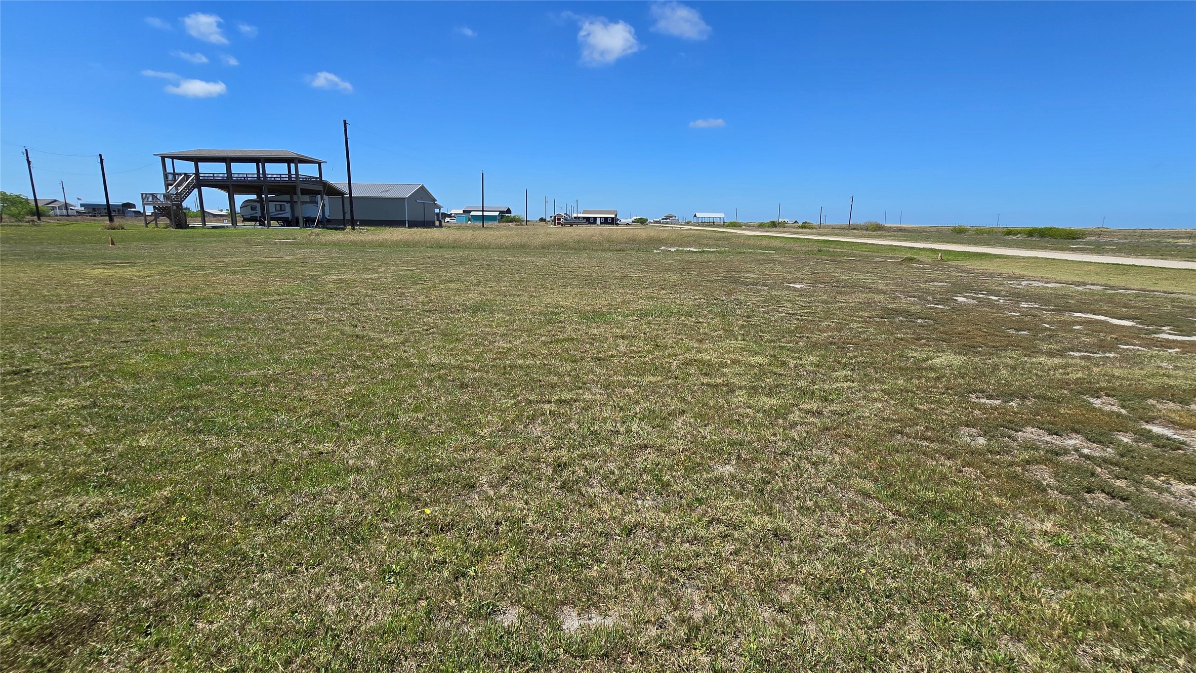 266 Ladyfish Road Palacios, TX 77465 - Photo 5 of 10 a view of a room with an ocean view