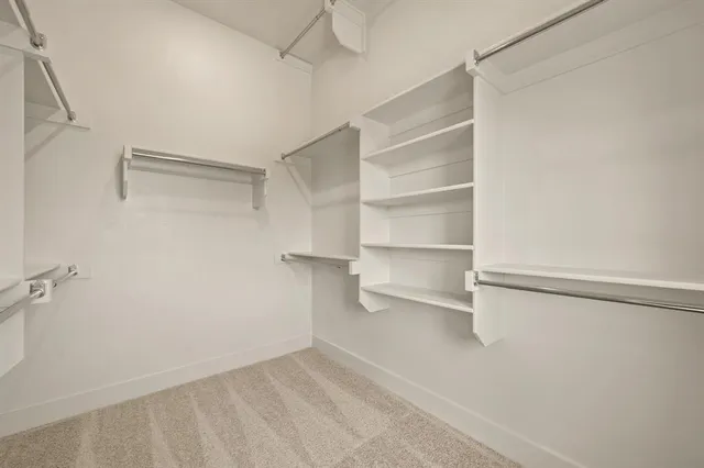 a bathroom with a sink double vanity and a mirror