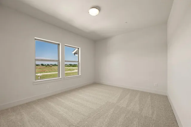 a bathroom with a shower sink vanity and mirror
