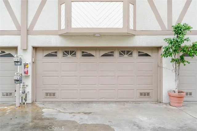 a very nice looking room with a bench and potted plant