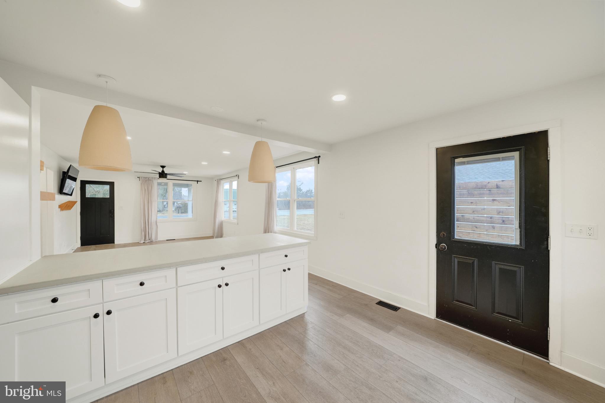 23 Old Bayview Road North East, MD 21901 - Photo 14 of 32 Bright and airy kitchen with modern charm.