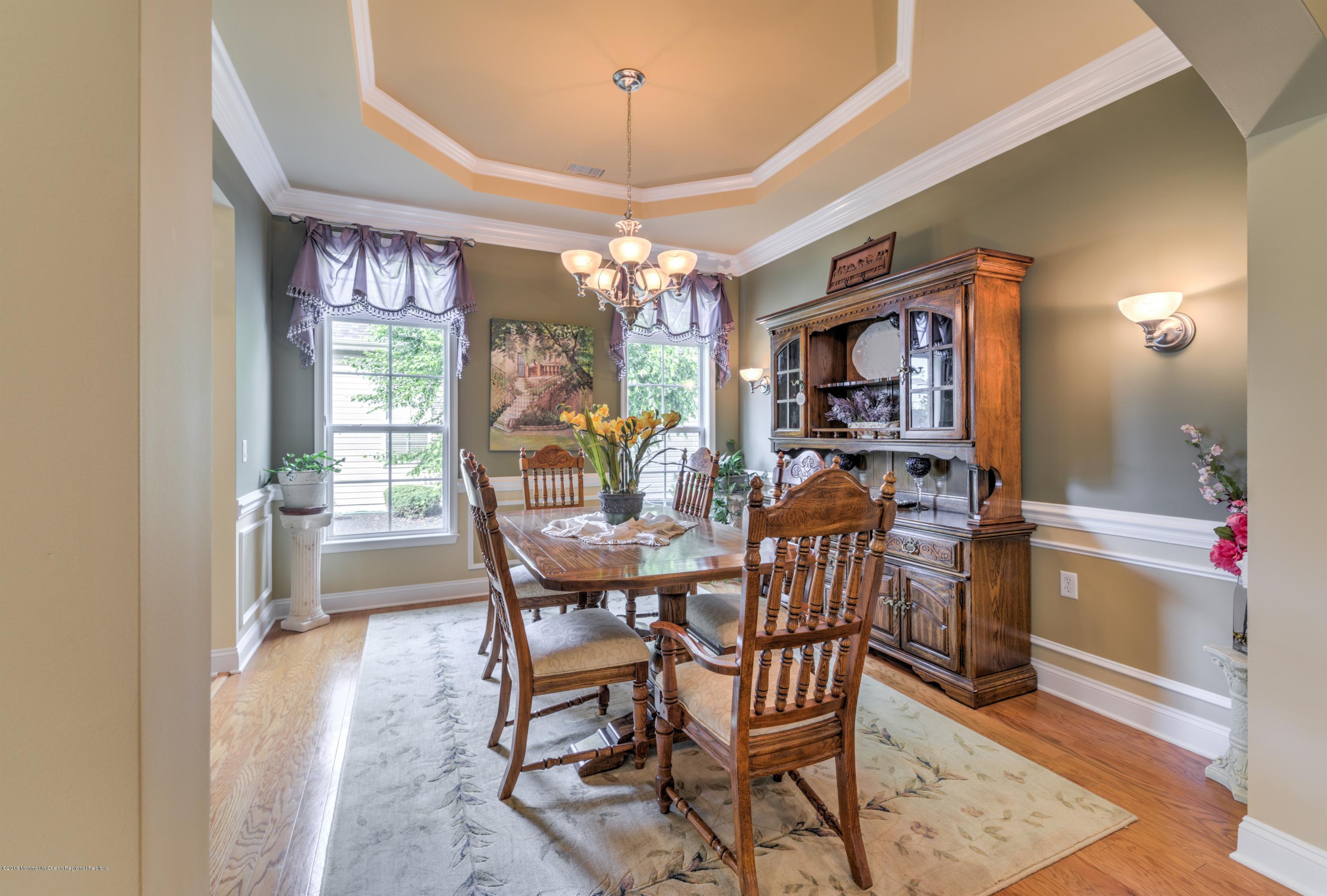 16 East Raphael Lane Farmingdale, NJ 07727 - Photo 13 of 50 a view of a dining room with furniture window and outside view