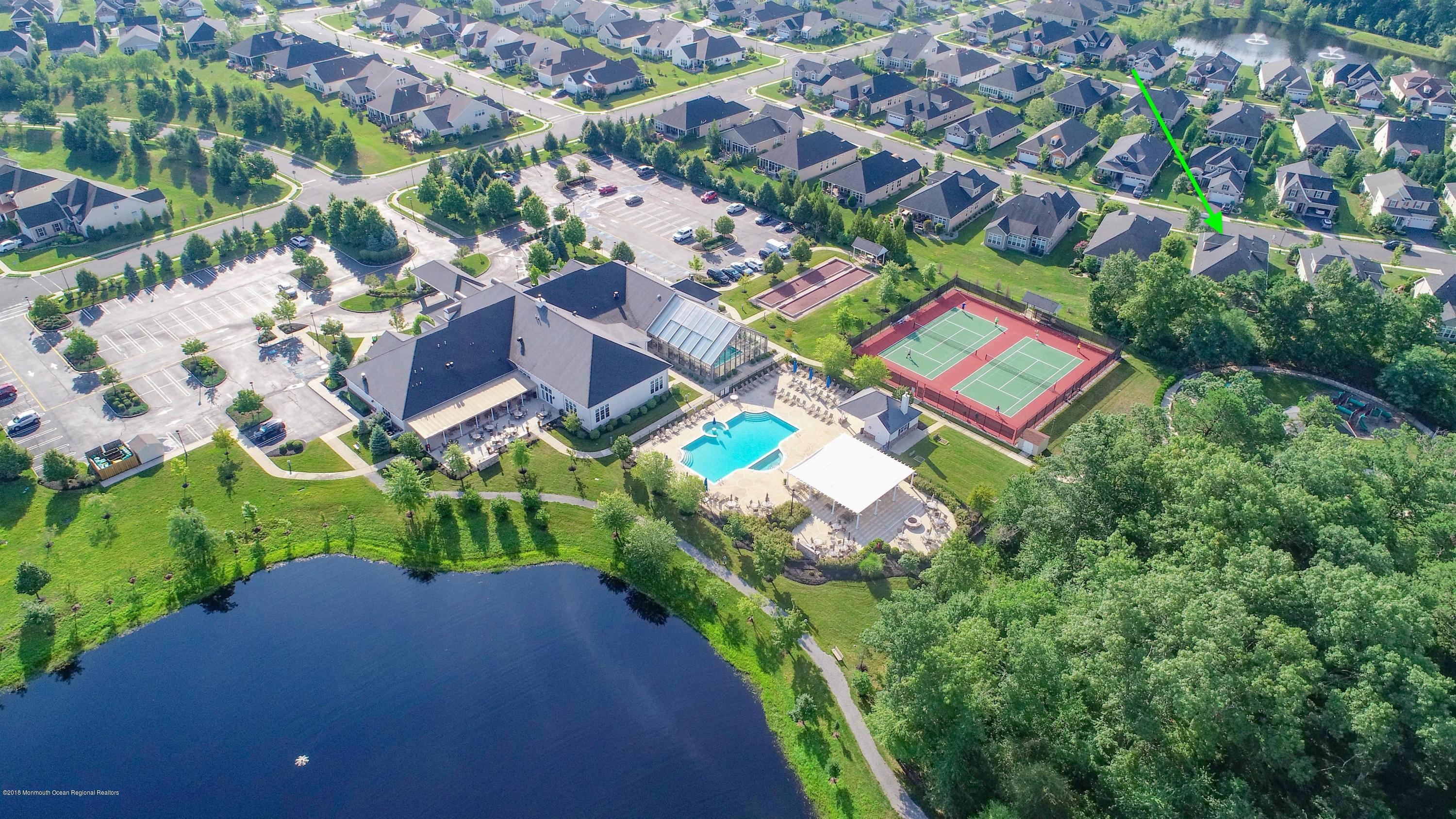 16 East Raphael Lane Farmingdale, NJ 07727 - Photo 43 of 50 an aerial view of a house with a yard
