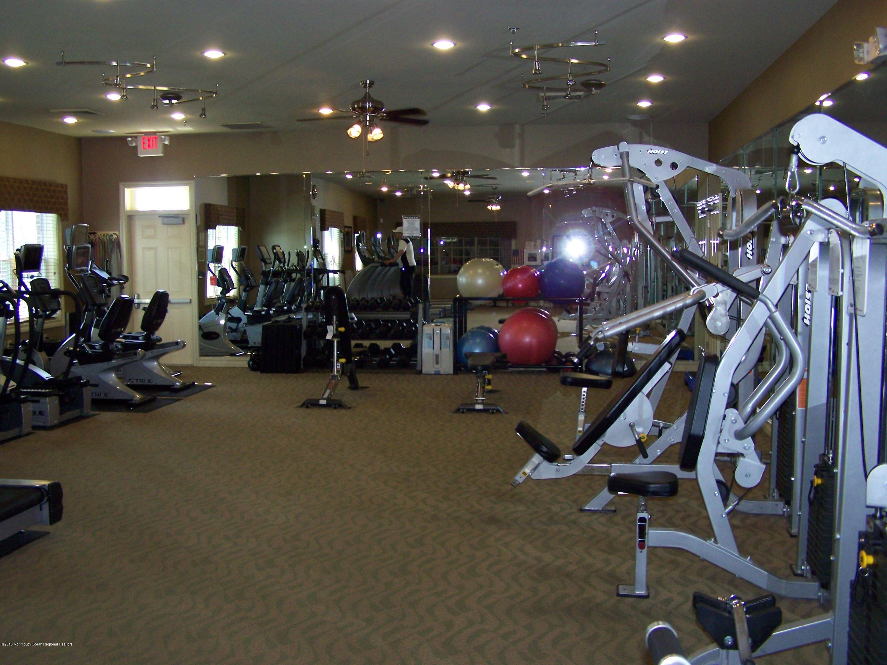 16 East Raphael Lane Farmingdale, NJ 07727 - Photo 50 of 50 a view of a room with gym equipment