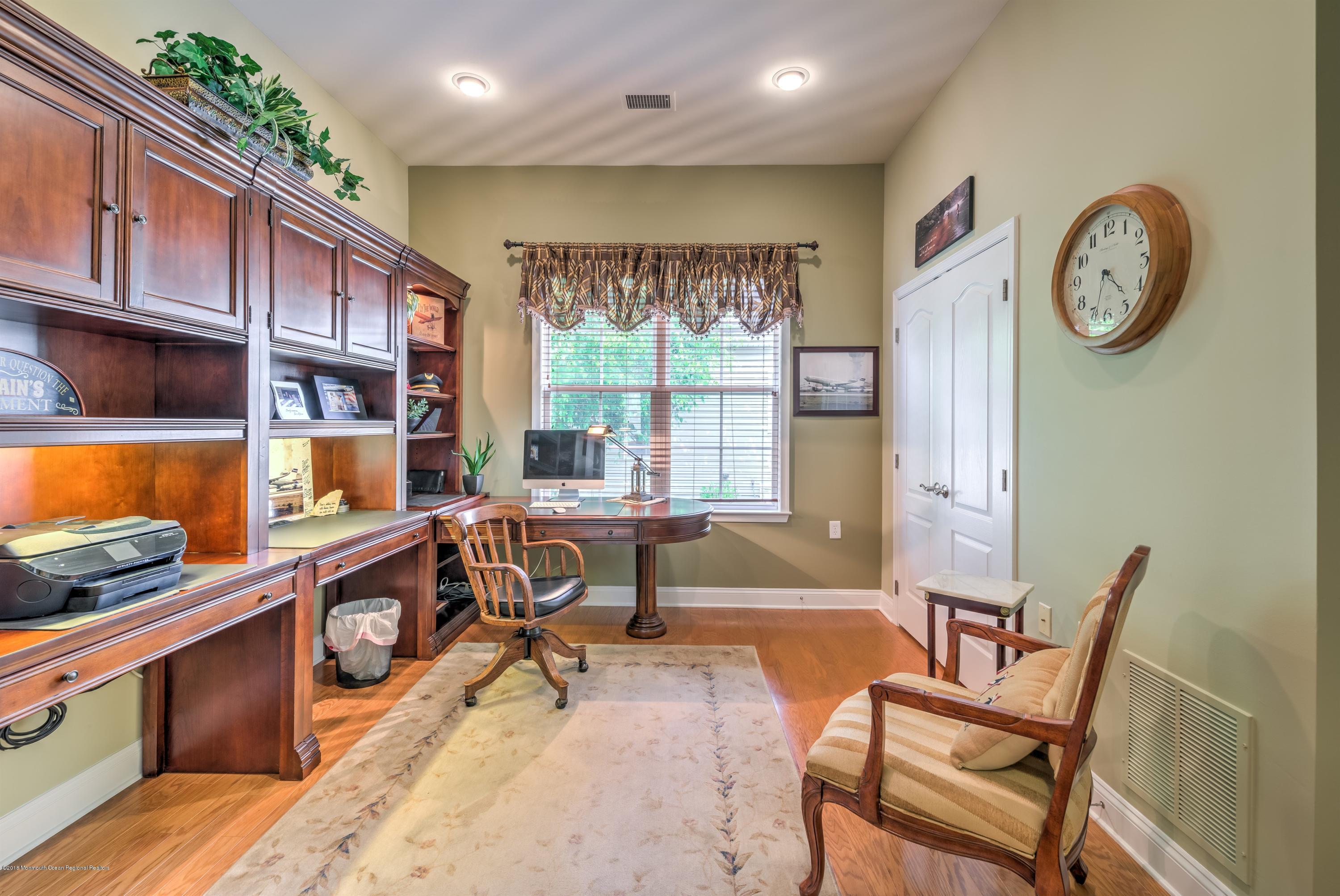16 East Raphael Lane Farmingdale, NJ 07727 - Photo 5 of 50 a view of a livingroom with workspace and a window