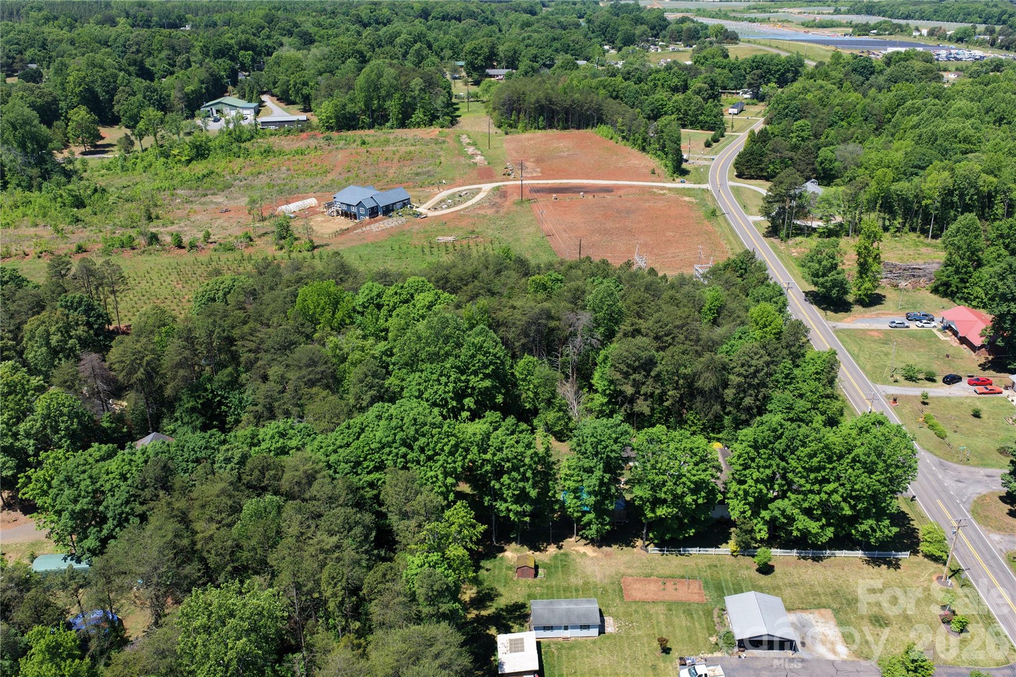 0 Deadmon Road Mocksville, NC 27028 - Photo 1 of 24 an aerial view of a house with a yard