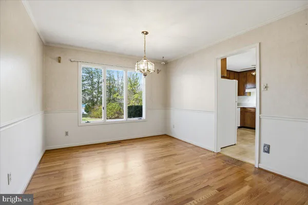 a kitchen with a sink a stove and refrigerator