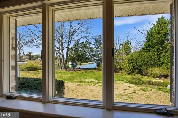 a view of a window with a kitchen