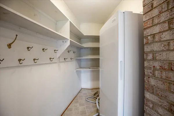 a view of a balcony with trees