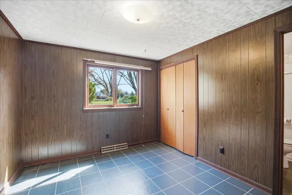 a view of a room with window and an outdoor view