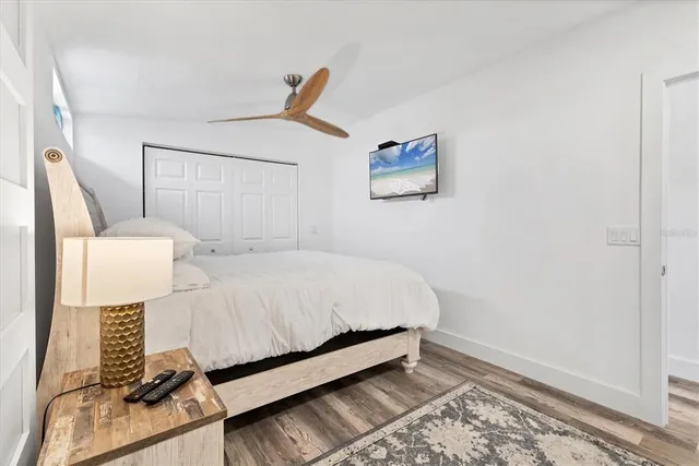 a bed room with a bed and a couch