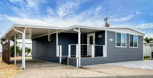 a front view of a house with parking