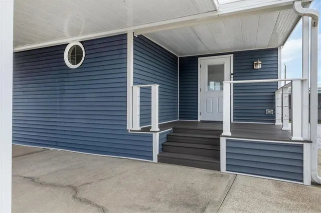 a view of a door of the house and window