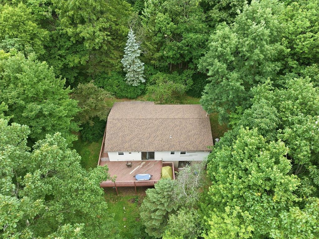 520 Highland Hill Road Jim Thorpe, PA 18235 - Photo 69 of 83 Nestled amidst verdant trees, a private deck extends from this secluded residence.