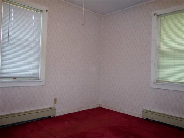 40 Cutler Road Holden, MA 01522 - Photo 7 of 11 an empty room with a window