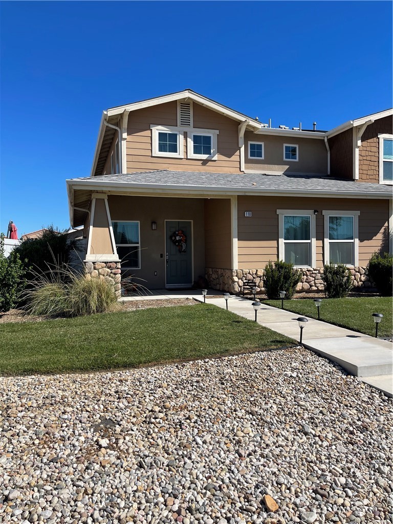 110 Main Street Piru, CA 93040 - Photo 2 of 15 a front view of a house with a yard