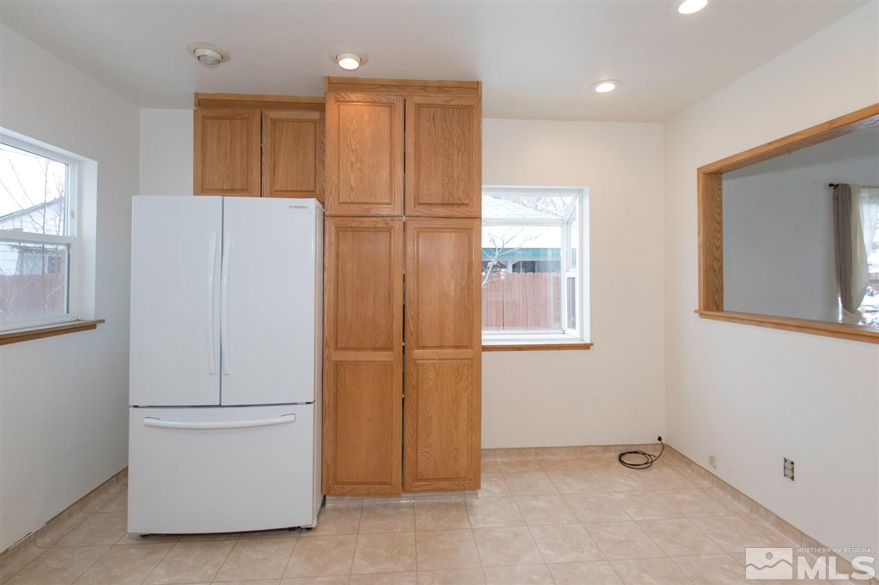 725 Balzar Circle Reno, NV 89502 - Photo 14 of 22 a view of kitchen with furniture and refrigerator