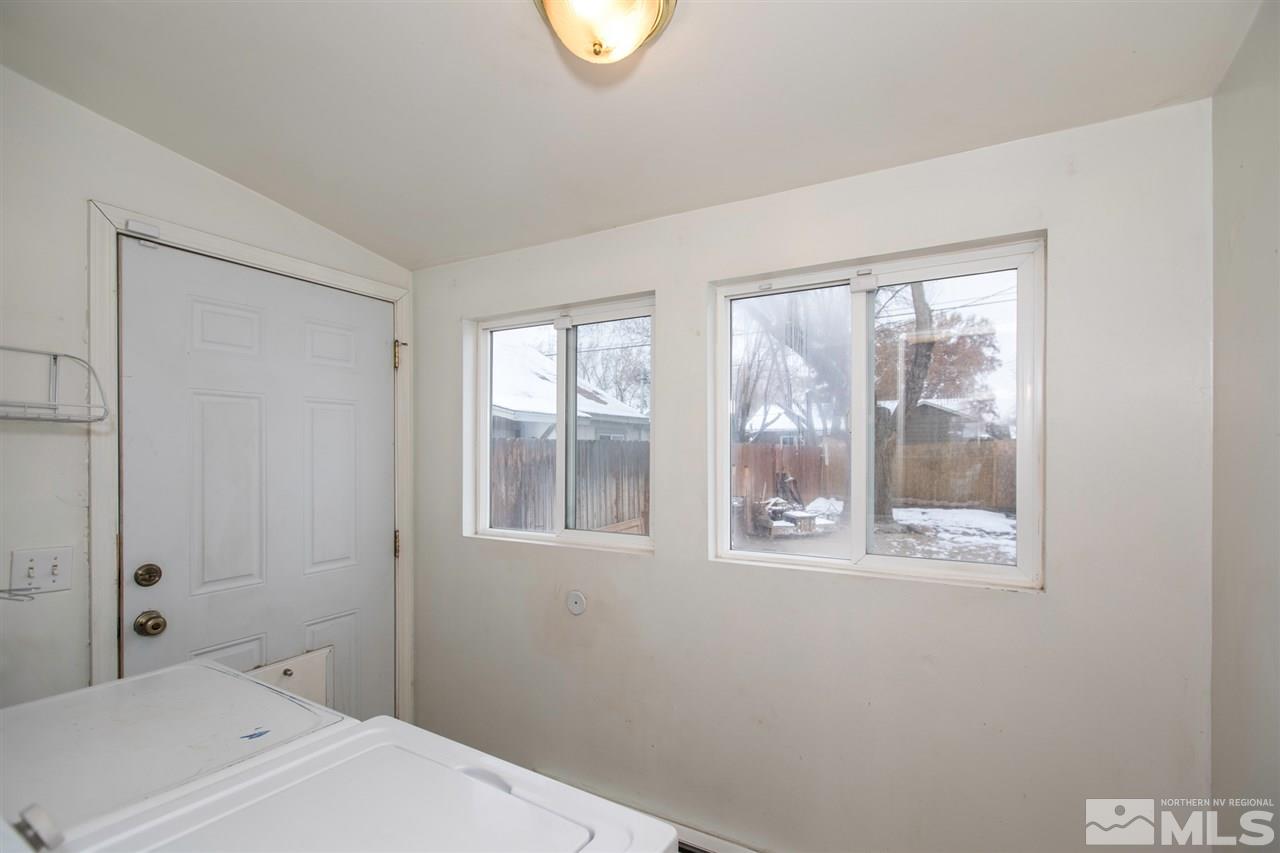725 Balzar Circle Reno, NV 89502 - Photo 16 of 22 a room with a window and a wooden floor