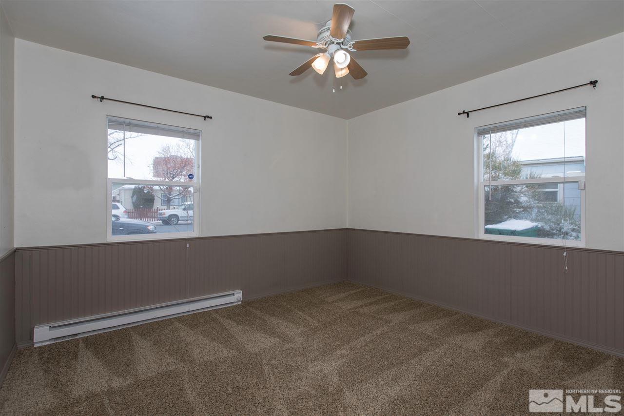 725 Balzar Circle Reno, NV 89502 - Photo 17 of 22 a view of room with window and ceiling fan