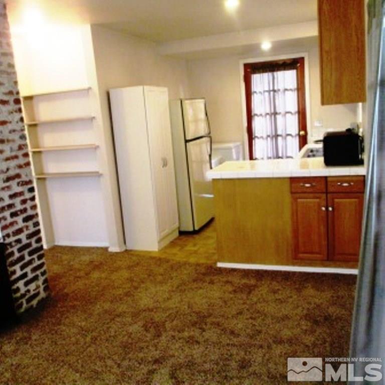 725 Balzar Circle Reno, NV 89502 - Photo 20 of 22 a view of a kitchen with window