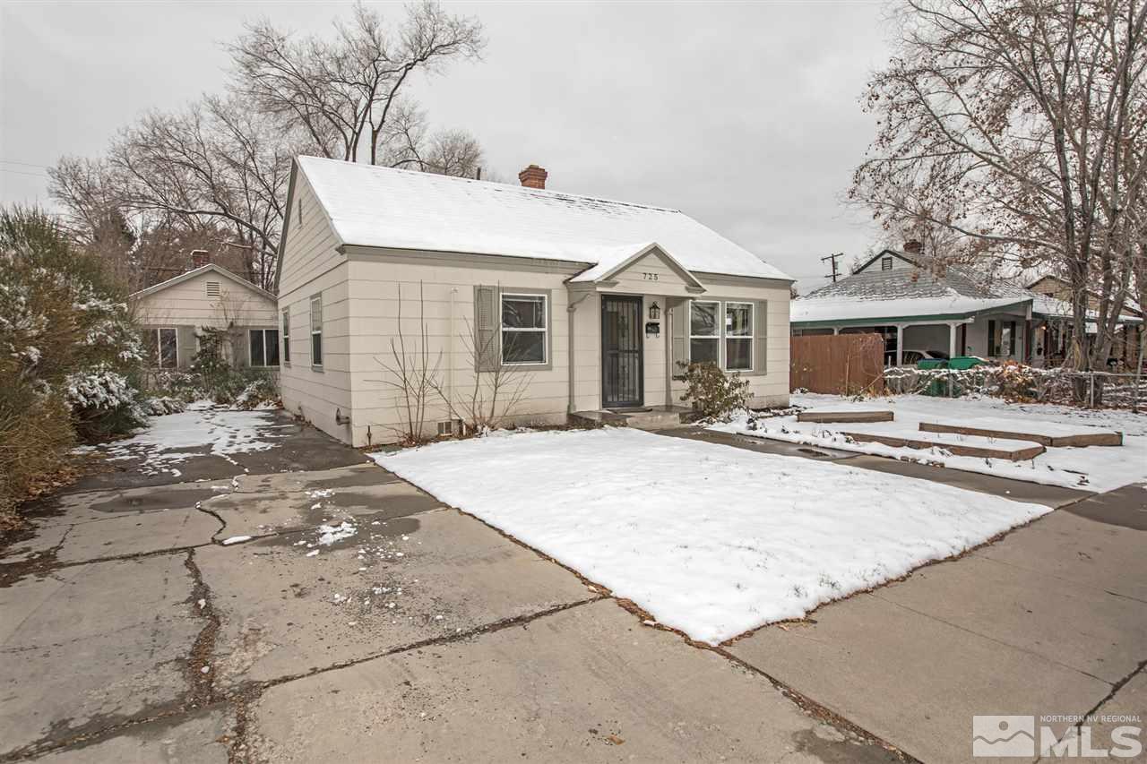 725 Balzar Circle Reno, NV 89502 - Photo 3 of 22 a front view of a house with a yard