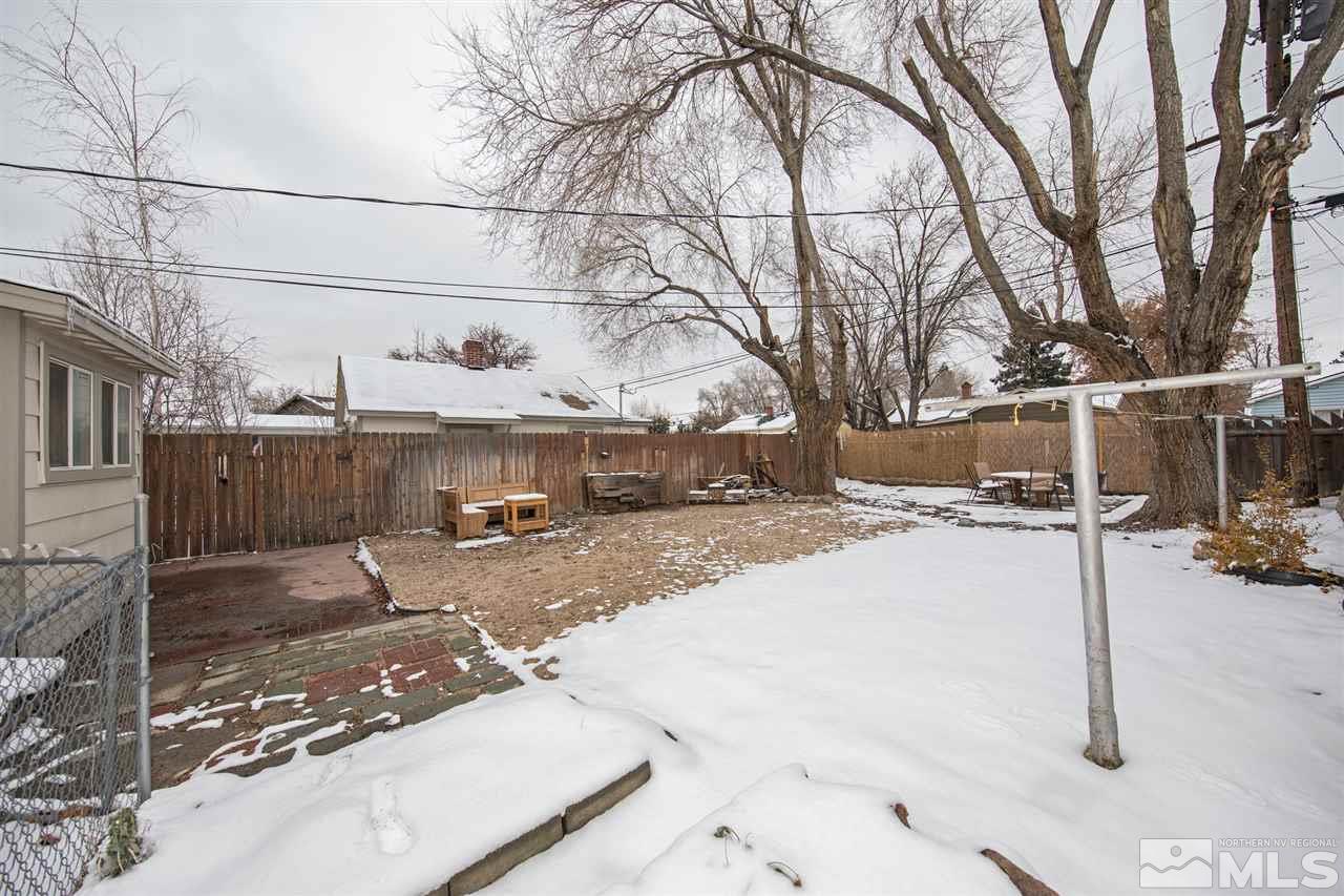 725 Balzar Circle Reno, NV 89502 - Photo 6 of 22 a view of a street with a tree