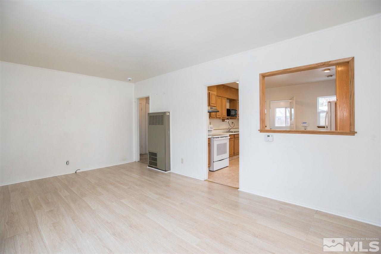 725 Balzar Circle Reno, NV 89502 - Photo 10 of 22 a view of empty room with wooden floor