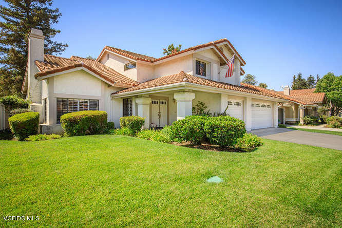 12440 Crystal Ranch Road Moorpark, CA 93021 - Photo 1 of 51 a front view of a house with a garden