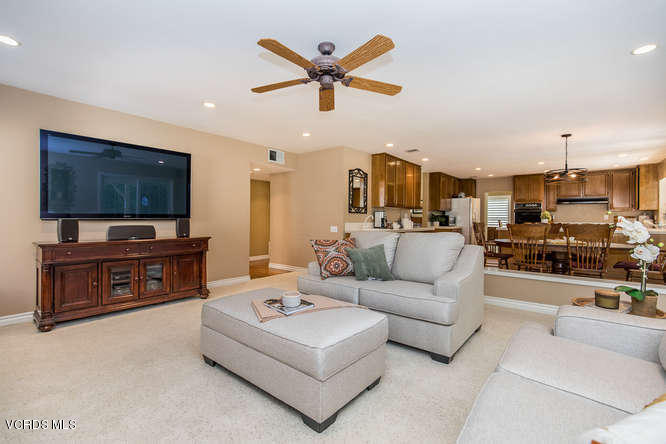 12440 Crystal Ranch Road Moorpark, CA 93021 - Photo 15 of 51 a living room with furniture and a flat screen tv