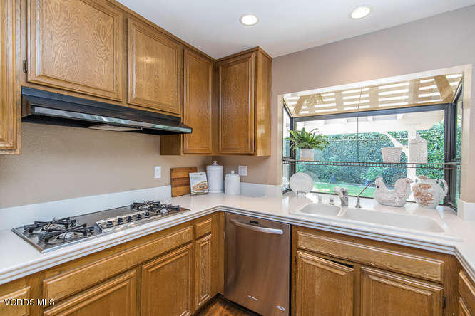 12440 Crystal Ranch Road Moorpark, CA 93021 - Photo 19 of 51 a kitchen with a sink cabinets and window