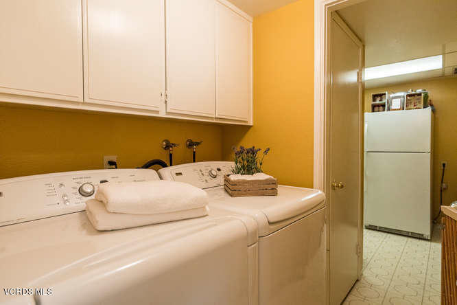 12440 Crystal Ranch Road Moorpark, CA 93021 - Photo 24 of 51 a utility room with dryer and washer