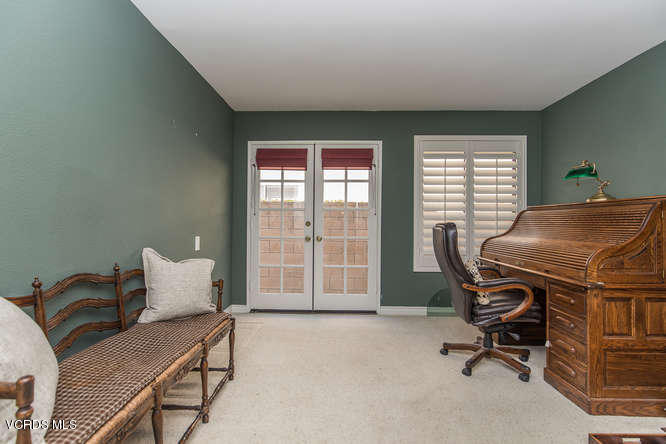 12440 Crystal Ranch Road Moorpark, CA 93021 - Photo 28 of 51 a view of a workspace with furniture and a window