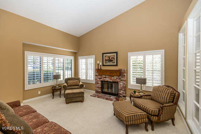 12440 Crystal Ranch Road Moorpark, CA 93021 - Photo 8 of 51 a living room with furniture large window and a fireplace