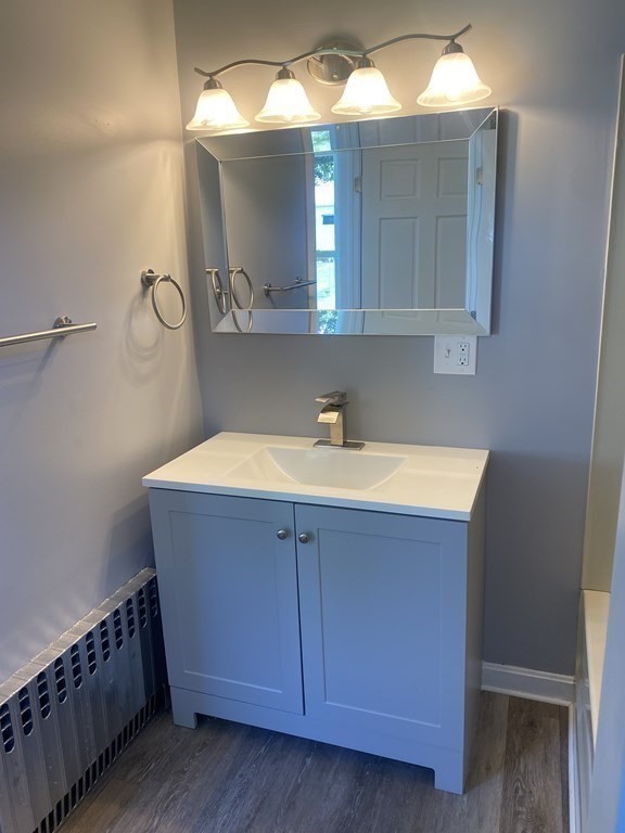 77 Carter Street Fall River, MA 02721 - Photo 16 of 25 a bathroom with a sink and a mirror