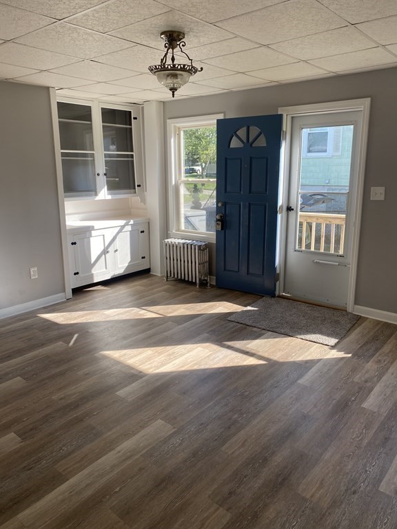 77 Carter Street Fall River, MA 02721 - Photo 17 of 25 a view of empty room with windows and wardrobe