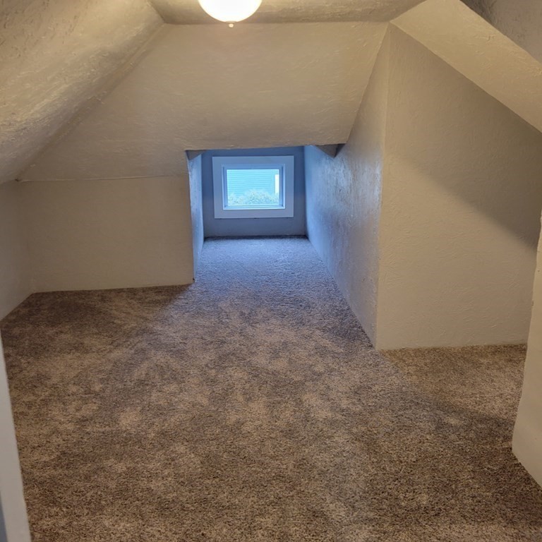 77 Carter Street Fall River, MA 02721 - Photo 22 of 25 a view of an empty room and window