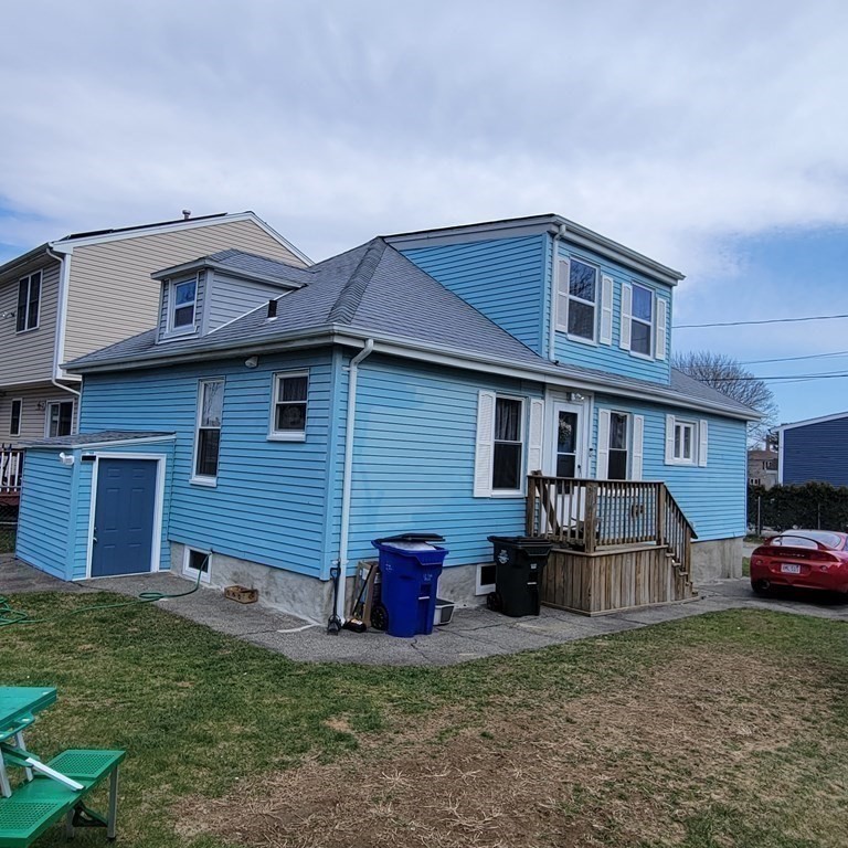 77 Carter Street Fall River, MA 02721 - Photo 4 of 25 a view of a house with a yard