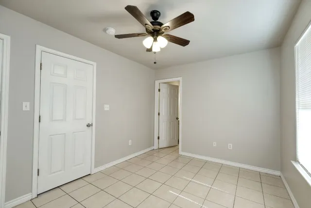 a view of an empty room and window