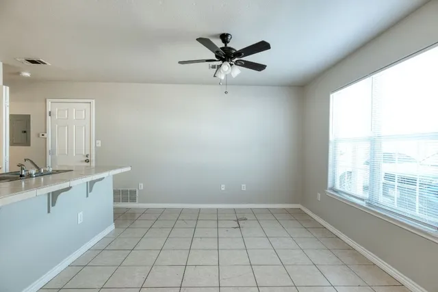 a view of a sink and a window in a room