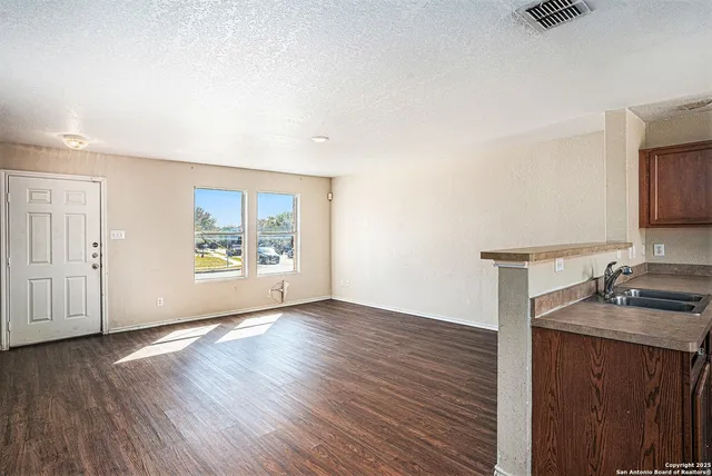 a workspace with furniture and window