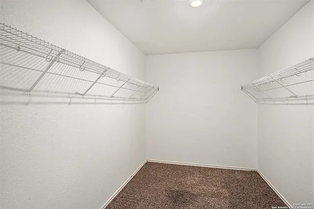 a view of a room with racks on the wall