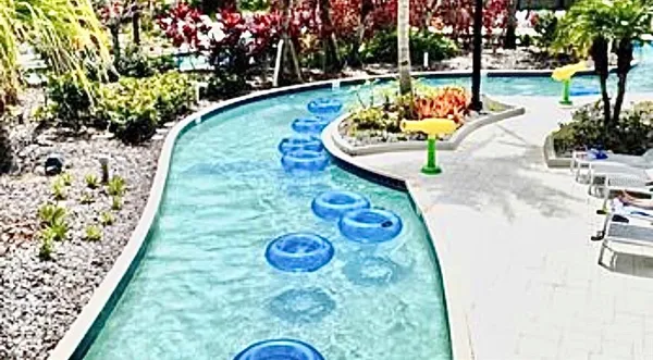 a view of swimming pool from a balcony