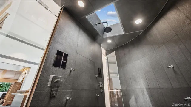 a outdoor space with patio furniture and a large window