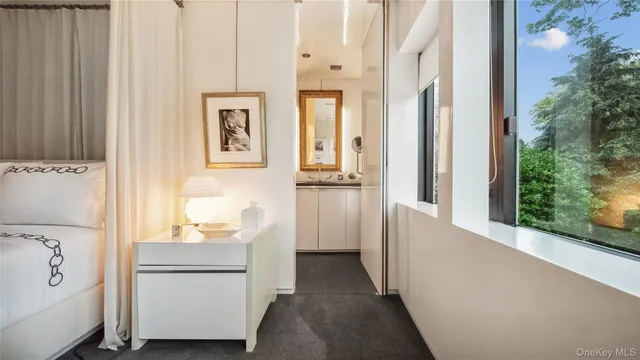 a view of a hallway with a kitchen