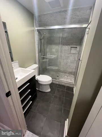 a bathroom with a sink and a shower