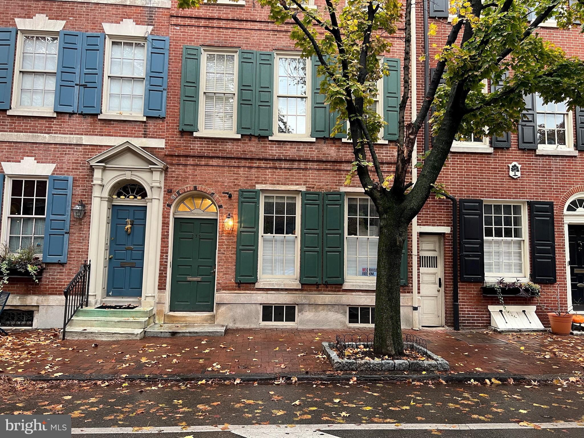 235 Pine Street Philadelphia, PA 19106 - Photo 18 of 18 front view of a brick house with a large windows