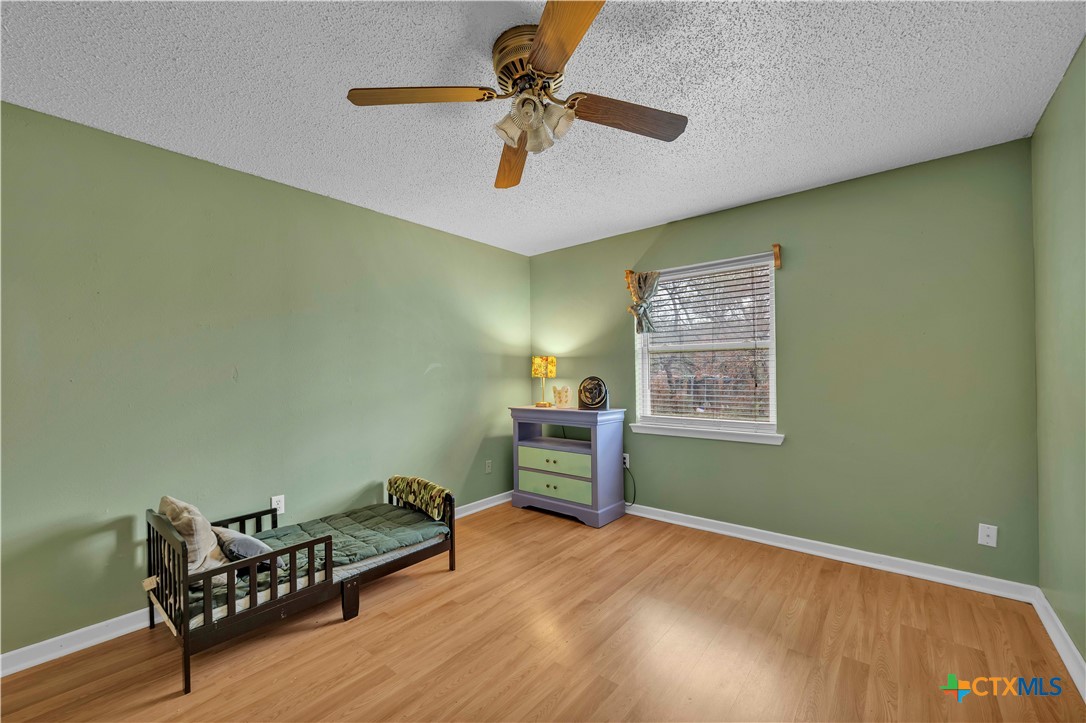 806 County Road 4756 Kempner, TX 76539 - Photo 23 of 33 a bedroom with furniture and a window