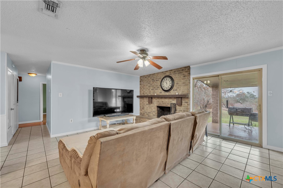 806 County Road 4756 Kempner, TX 76539 - Photo 7 of 33 a view of living room with furniture and a flat screen tv